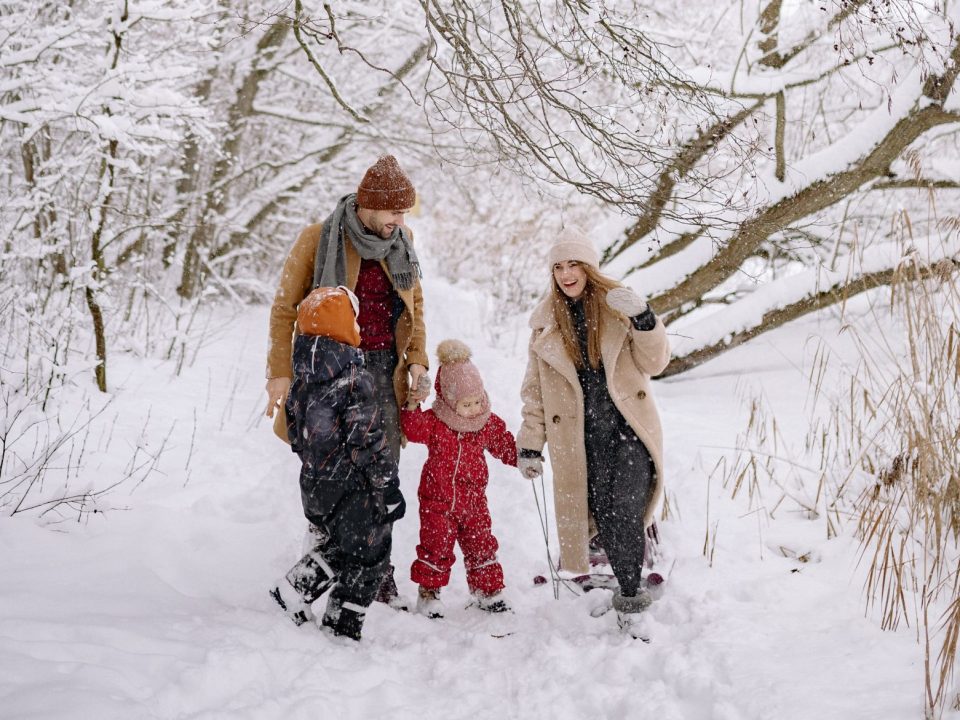 Family in a snowy forest